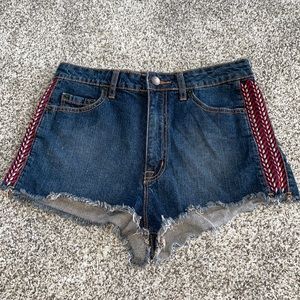 BDG high rise cheeky shorts w/colorful embroidery down the sides. Waist 30”.